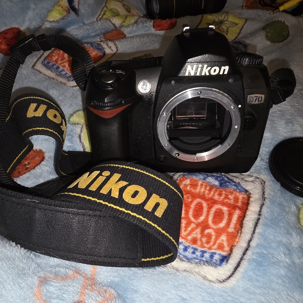 Nikon Black and Yellow DSLR Camera
